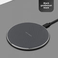 Black 15W aluminum alloy wireless charging pad on a gray background with 'Black gentleman black' text.